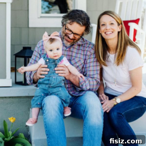 Seven Months with Charlie 11 Family photo of mother, father, and baby Charlie, showcasing their happy first Mother's Day celebration.