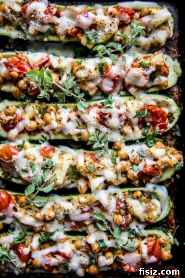 Zucchini Boats with Tuscan Chickpea Filling 3 Close-up of Tuscan Chickpea Stuffed Zucchini Boats ready for serving.