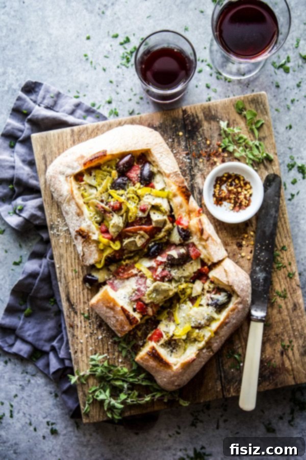 Loaded Antipasto Cheese Bread 6 Layered Antipasto Cheese Bread, golden brown and perfectly baked
