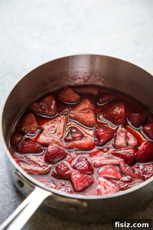 Crimson Gin Tonic 4 Ingredients for Strawberry Gin and Tonic, including fresh strawberries, gin, and tonic water