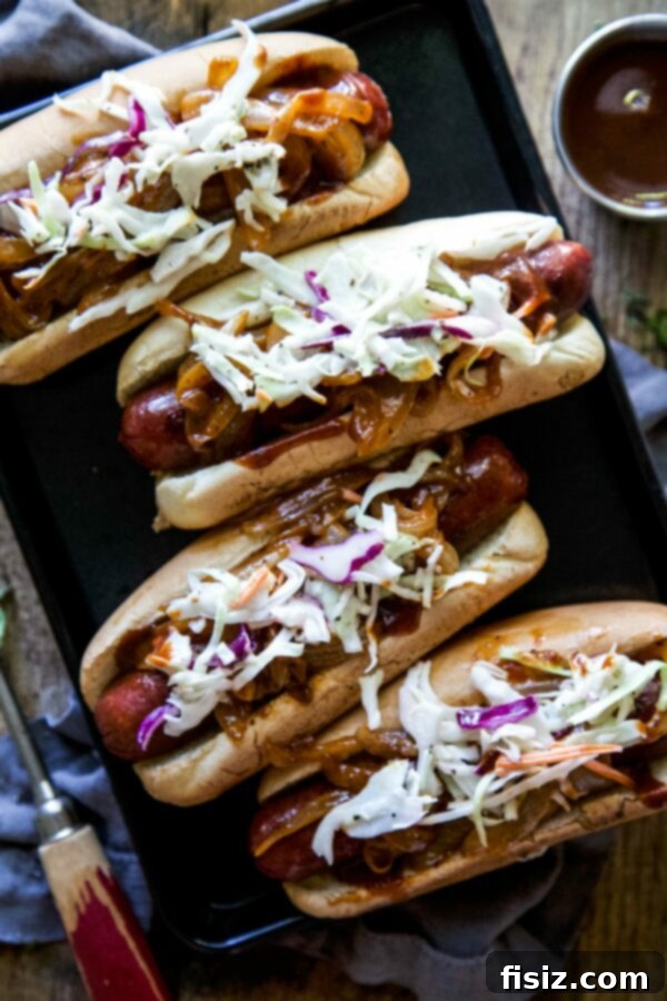 Loaded Barbecue Bison Hot Dogs 2 Delicious Loaded Barbecue Bison Hot Dogs garnished with fresh toppings