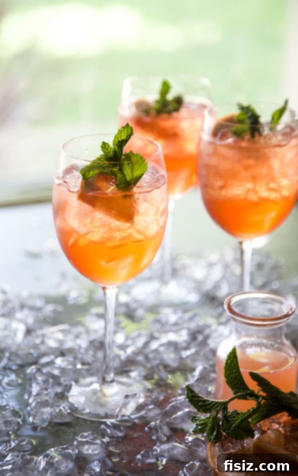 Fresh Mint Rosé Aperol Spritz 2 Refreshing Rosé-Aperol Spritz with Fresh Mint garnish, perfect for summer