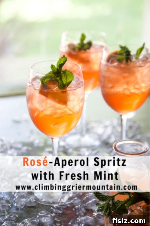 Fresh Mint Rosé Aperol Spritz 8 Overhead shot of two Rosé-Aperol Spritz cocktails with mint and grapefruit