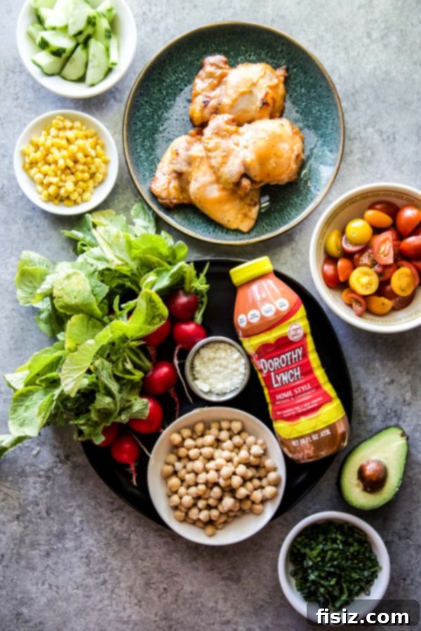 Dorothy Lynch Glazed Chicken and Zesty Summer Chickpea Salad 5 Boneless, skinless chicken thighs marinating in Dorothy Lynch Dressing in a resealable bag.