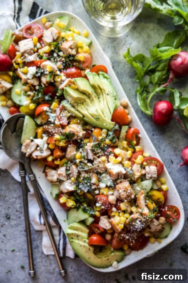 Dorothy Lynch Glazed Chicken and Zesty Summer Chickpea Salad 7 A beautifully plated bowl of Summer Chickpea Salad with Dorothy Lynch Grilled Chicken, ready to be served.
