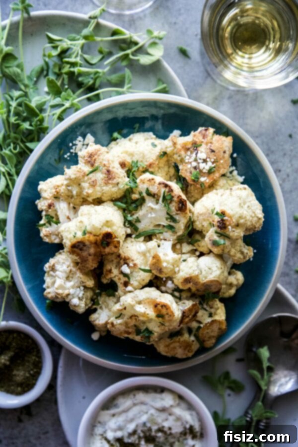Crispy Zaatar Cauliflower Bites 2 Crispy Za'atar Baked Cauliflower Nuggets on a serving plate
