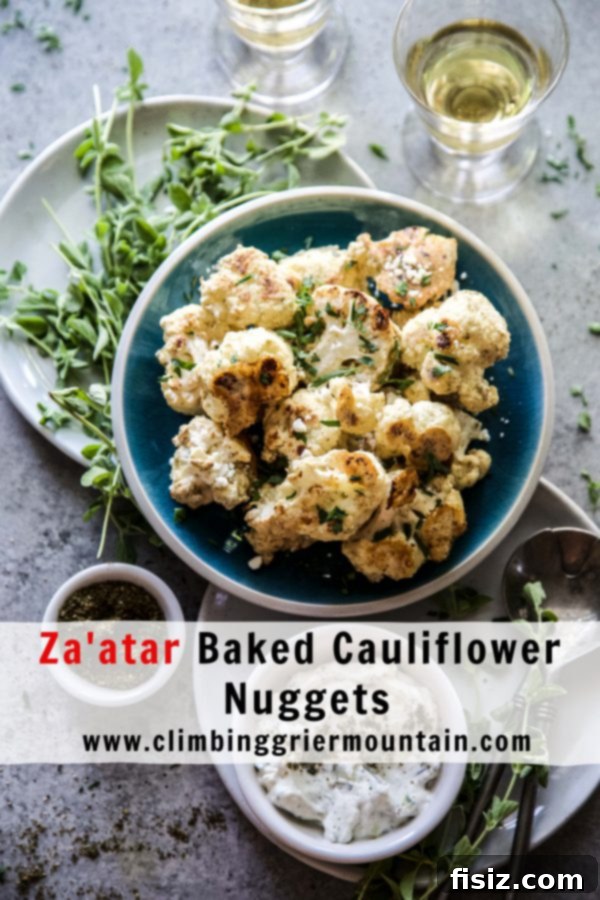 Crispy Zaatar Cauliflower Bites 8 A beautifully plated dish of Za'atar Baked Cauliflower Nuggets with dip and garnish