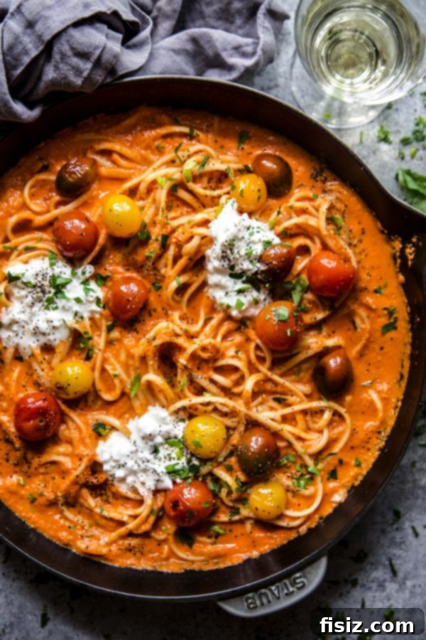 Indulgent Roasted Red Pepper Alfredo with Burst Tomatoes and Creamy Burrata 6 Ingredients for Roasted Red Pepper Alfredo laid out, including peppers, cream, and cheese.