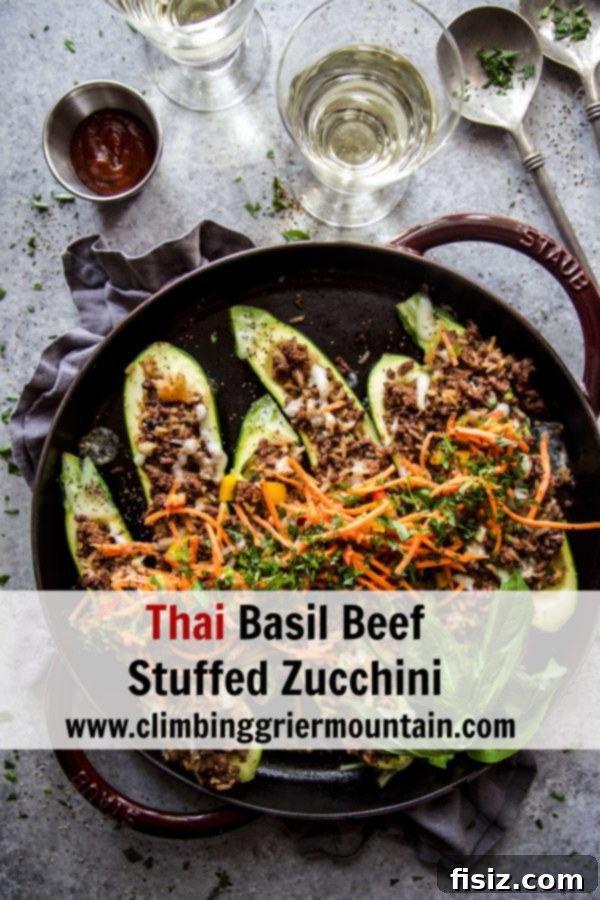 Thai Basil Beef Zucchini Boats 9 A vibrant platter of Thai Basil Beef Stuffed Zucchini boats, ready to be served as a healthy and flavorful meal.