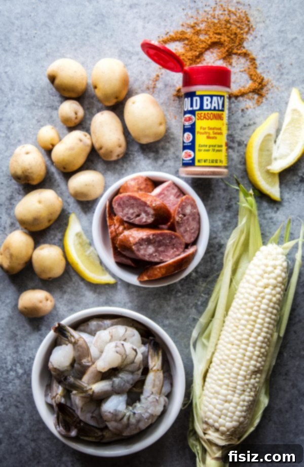 Close-up of fresh red potatoes and corn on the cob, key ingredients for a shrimp boil