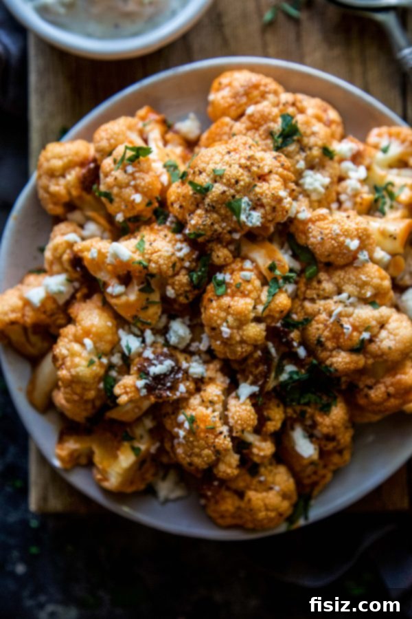 Smoked Blue Cheese Buffalo Cauliflower Poppers 3 Close-up of Buffalo Cauliflower Bites showing their texture and vibrant color