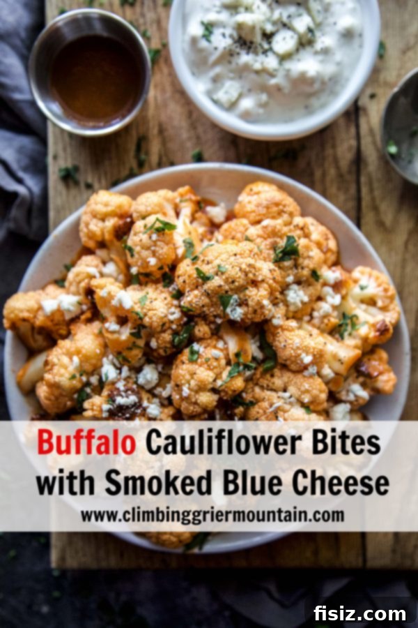 Smoked Blue Cheese Buffalo Cauliflower Poppers 7 A close-up shot of Buffalo Cauliflower Bites and Smoked Blue Cheese Dip on a serving board