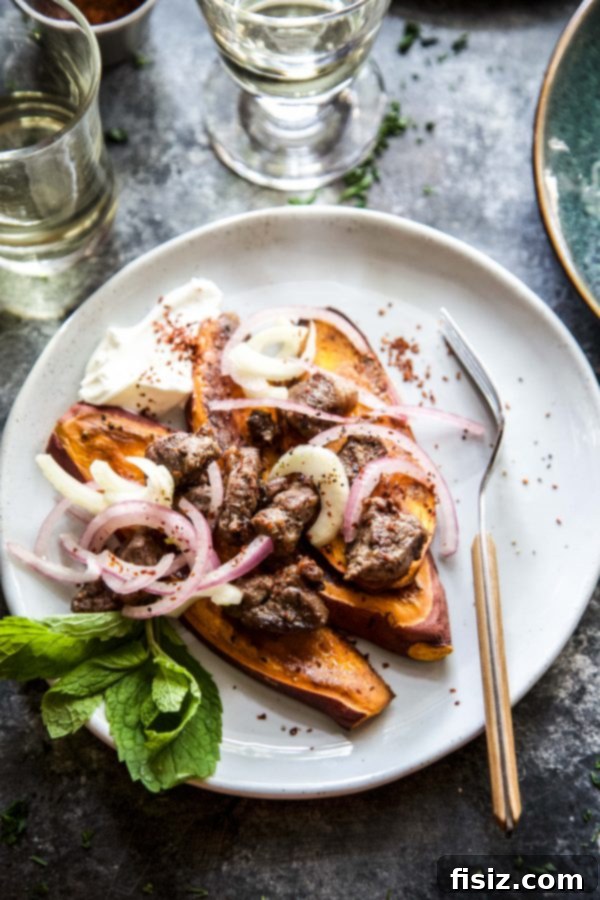 Moroccan Spiced Lamb and Sweet Potato Bowls 6 Final presentation of Sweet Potato Moroccan Lamb Bowls, garnished with fresh mint and Labneh, ready to be enjoyed.