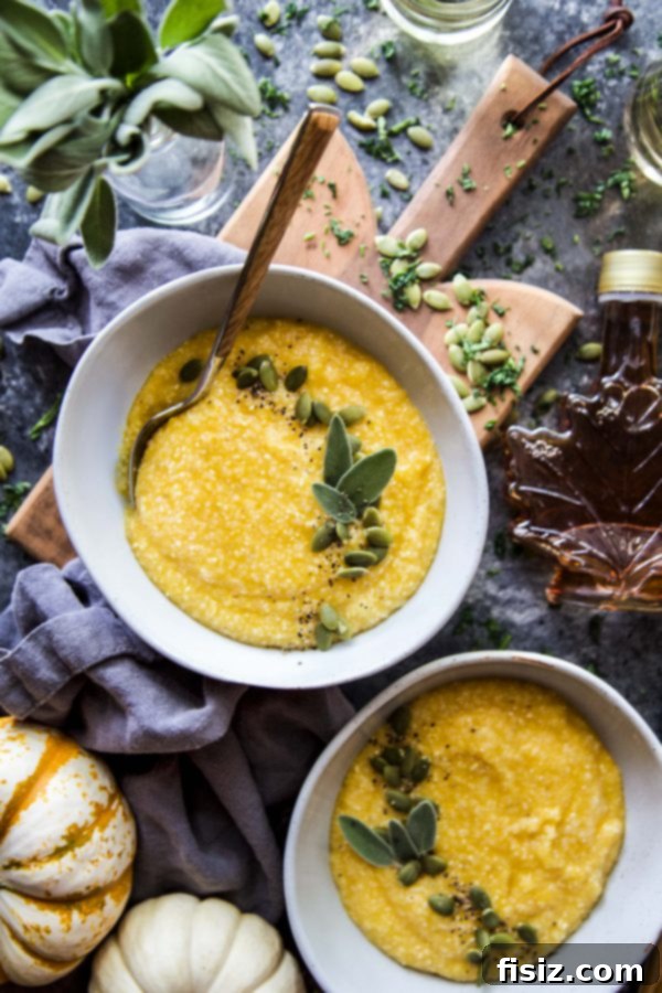 Creamy Maple Roasted Pumpkin Grits 3 Close-up of a serving of Maple Roasted Pumpkin Grits, showing its creamy texture and rich color.