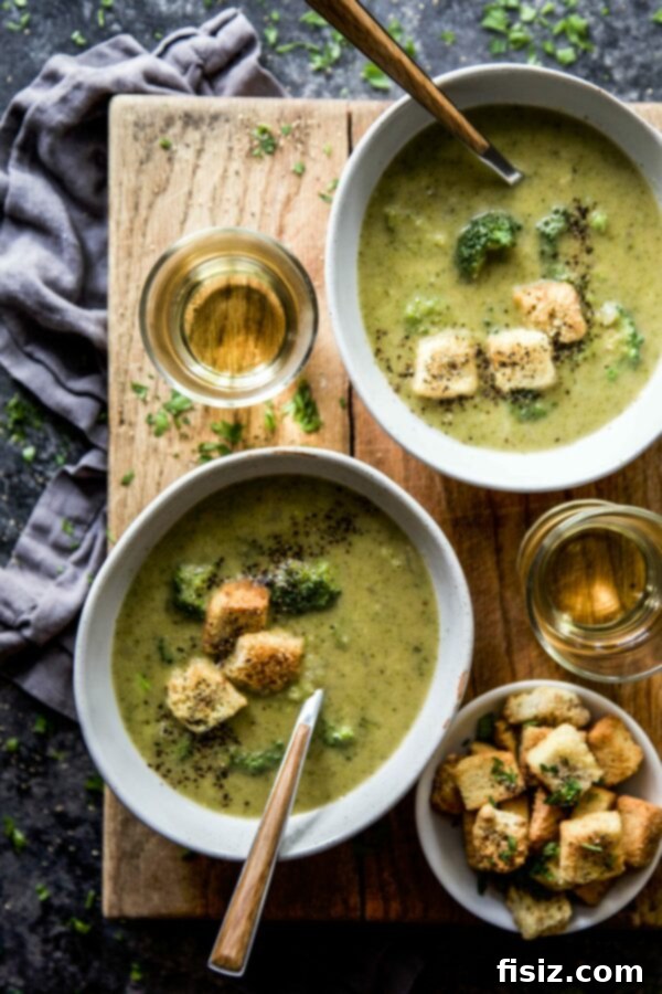 Creamy Smoked Gouda Broccoli Soup with Crispy Garlic Cheese Croutons 2 Creamy Smoked Gouda Broccoli Soup in a bowl with garlic cheese croutons on top, viewed from above.