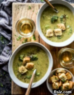 Smoked Gouda Broccoli Soup with Garlic Cheese Croutons in a bowl, ready to serve.