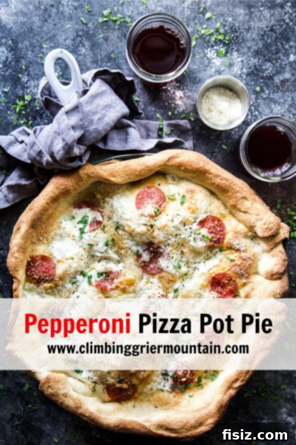 A slice of Pepperoni Pizza Pot Pie on a plate, revealing the layers of cheese, filling, and crust