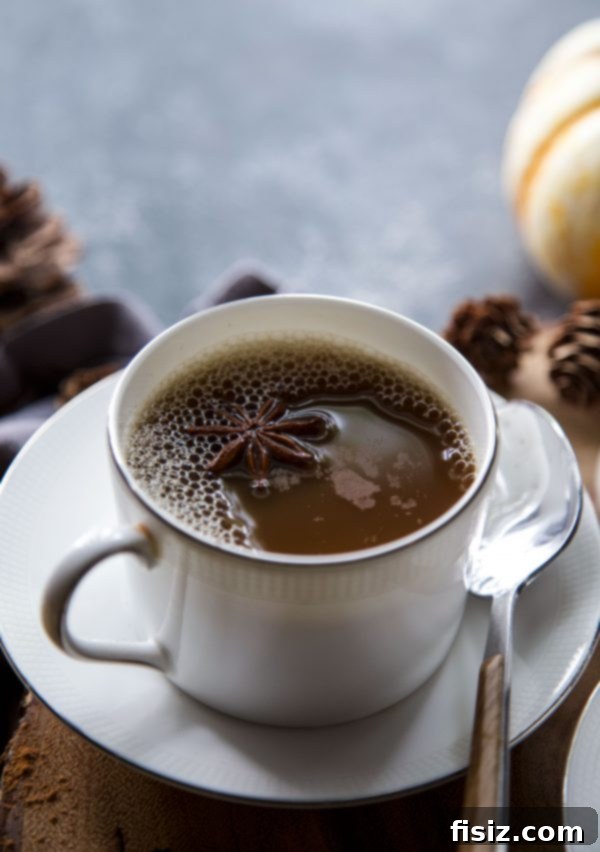 Spiced Coconut Pumpkin Latte 2 Delicious Coconut Pumpkin Latte served in a glass mug