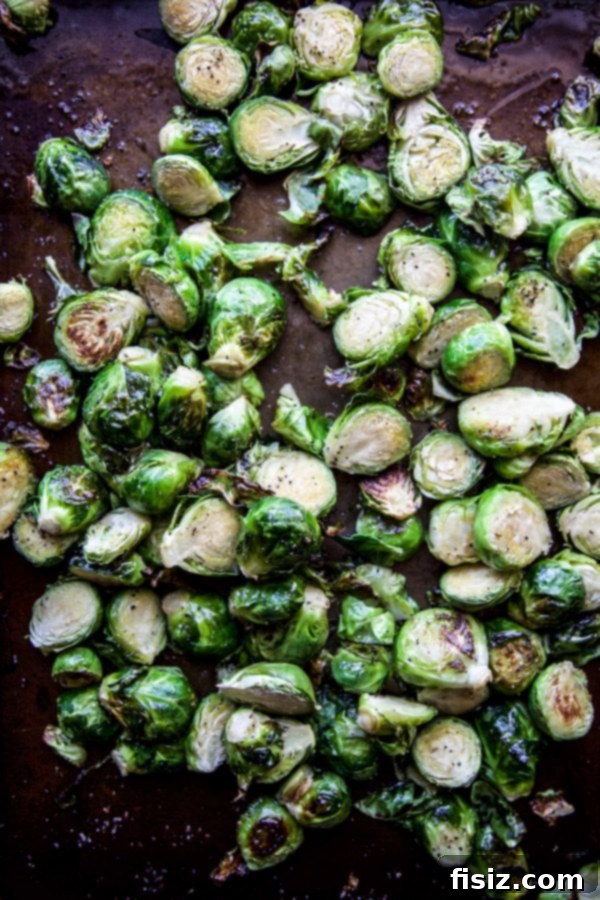Zesty Brussels Sprouts with Pistachio Crunch 5 Cooked Brussels sprouts in a skillet with the glaze
