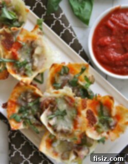 Veggie Pizza Wonton Cups 2 Final product of Wonton Veggie Pizza Bites, garnished and ready to serve