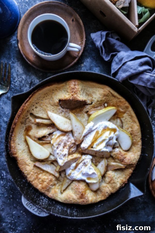 Unwrap Your Best Holiday 3 Puffed Pear Pancake, a delightful and airy holiday breakfast option featuring sweet pears.
