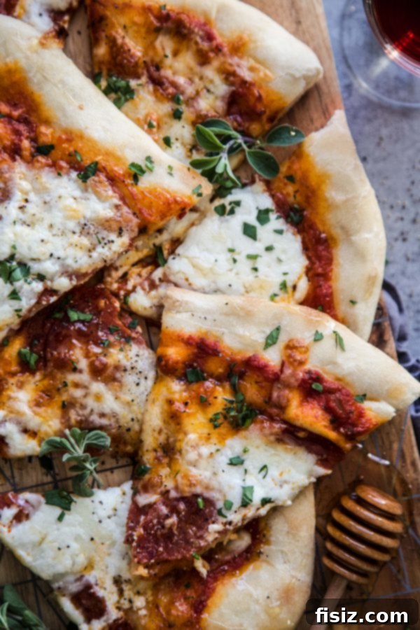 Simple Hot Honey Pepperoni Pizza 3 Close-up of freshly baked pepperoni pizza with hot honey drizzle