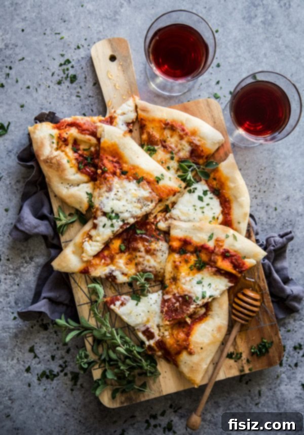 Simple Hot Honey Pepperoni Pizza 9 Easy Pepperoni Pizza with Hot Honey, sliced and ready to serve