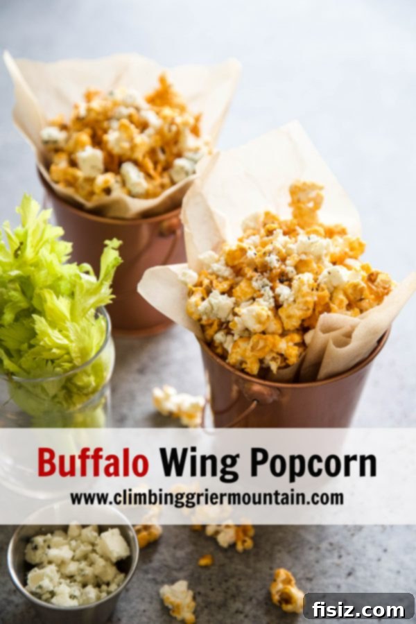 Buffalo Blaze Popcorn 8 Close-up of Buffalo Wing Popcorn with a focus on blue cheese crumbles