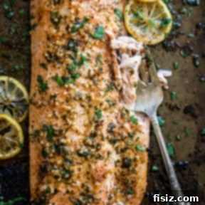 Spicy Cajun Salmon with Rich Garlic Parmesan Sauce 7 Baked Cajun Salmon with Garlic Parmesan Sauce recipe image