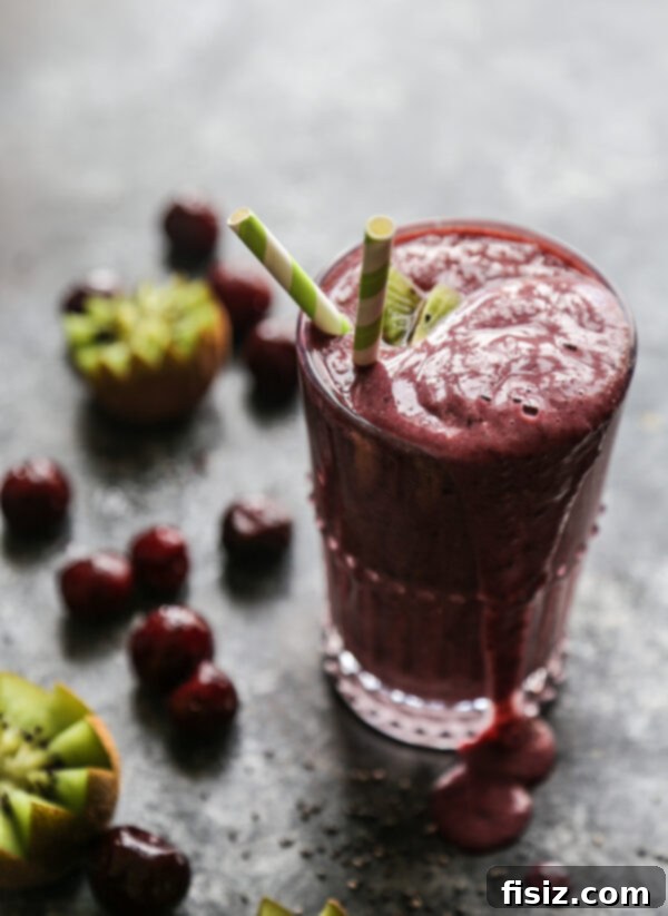 January's Creative Kickoff: My Must-Make List 8 A vibrant, protein-packed raspberry kiwi smoothie, garnished with fresh fruit, ready to energize your day