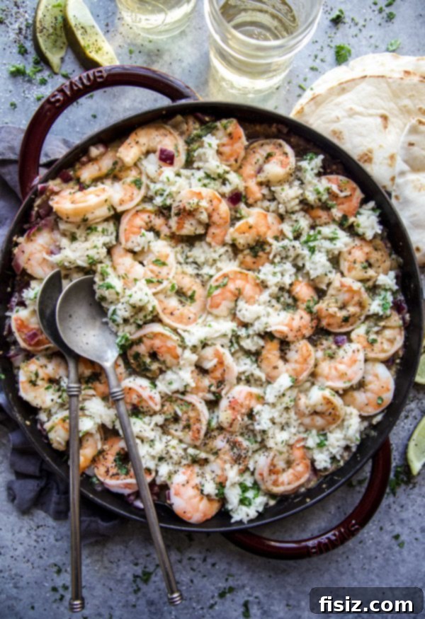 Zesty Salsa Verde Shrimp and Cilantro Rice Skillet 6 Salsa Verde Shrimp and Cilantro Rice Skillet garnished with fresh cilantro and lime wedges