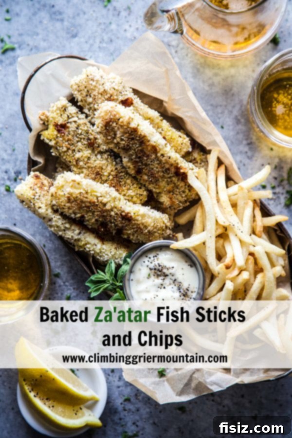 Zaatar Crusted Fish and Chips 8 A final shot of the delicious Baked Za'atar Fish Sticks and Chips on a table, with a rustic, inviting presentation.