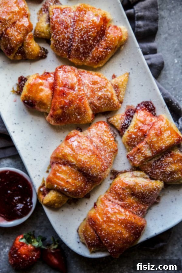 Sweet Strawberry Cardamom Croissants 3 Easy Strawberry and Cardamom Croissants cooling on a serving tray, ready to be enjoyed