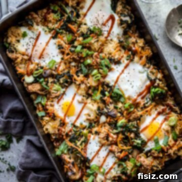 Vibrant Bibimbap Casserole with Ground Pork, garnished and ready to serve