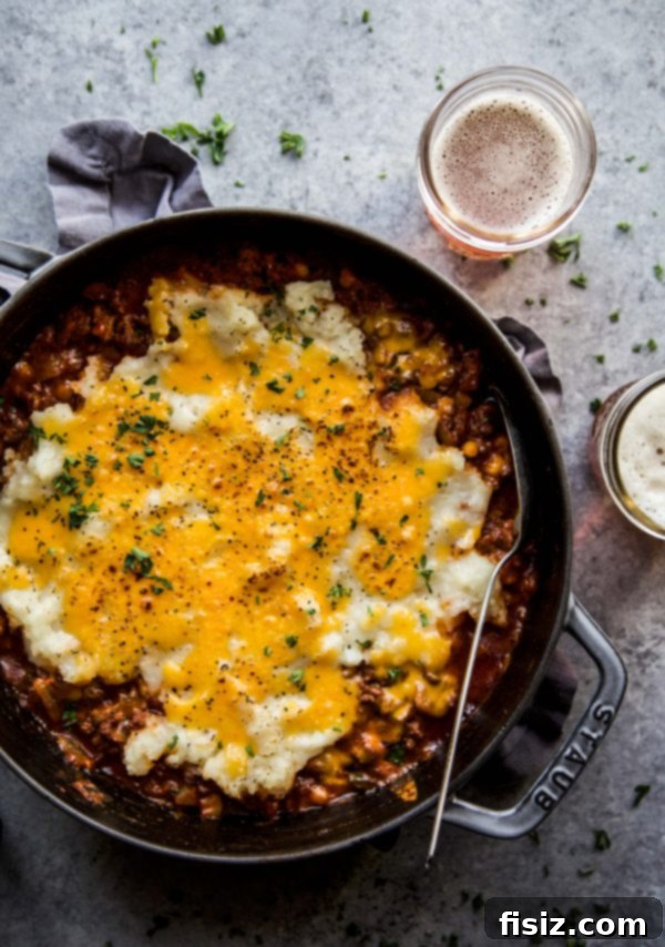 Cheeseburger shepherd's pie fresh out of the oven in a skillet