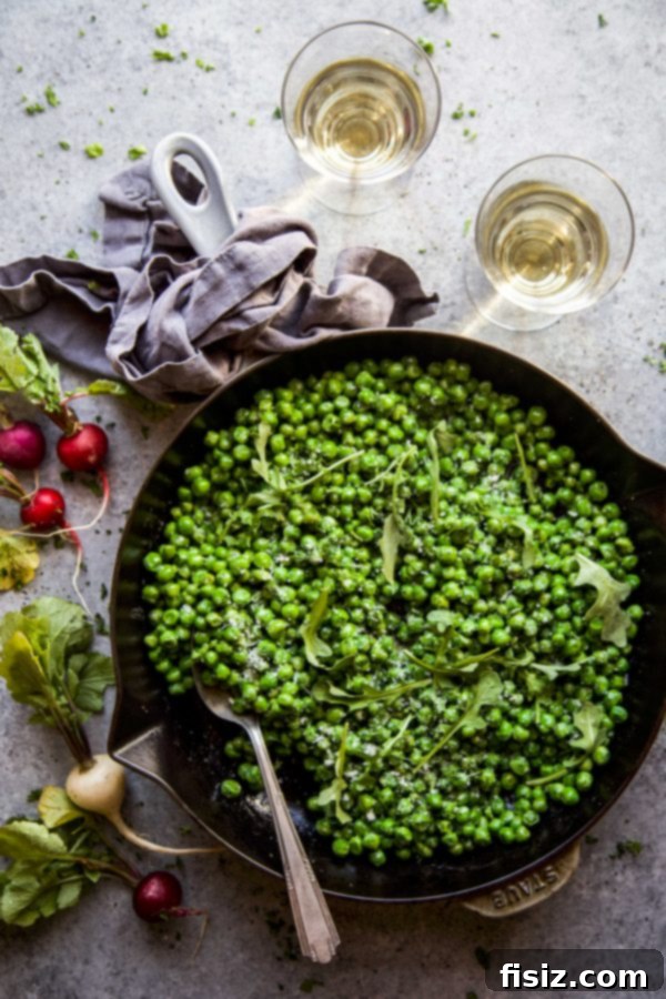 Cacio e Pepe Greens and Peas 7 A beautifully composed flat lay of Peas and Greens with Cacio e Pepe Dressing, featuring fresh ingredients and a rustic aesthetic. www.climbinggriermountain.com