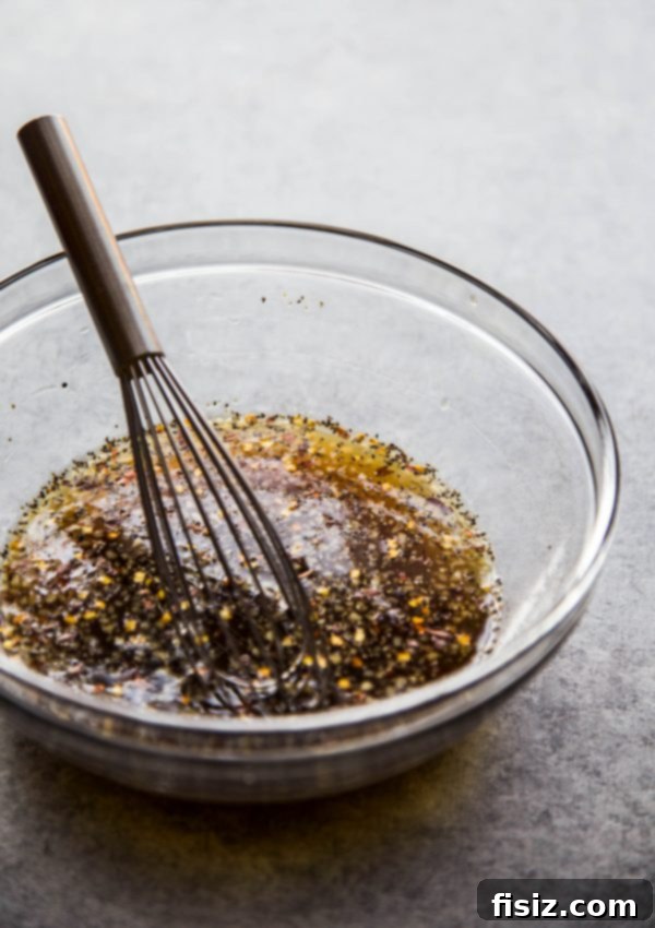 Sweet & Bold Black Pepper Chicken 4 Close-up of the rich, dark caramelized black pepper sauce in a mixing bowl, ready for cooking
