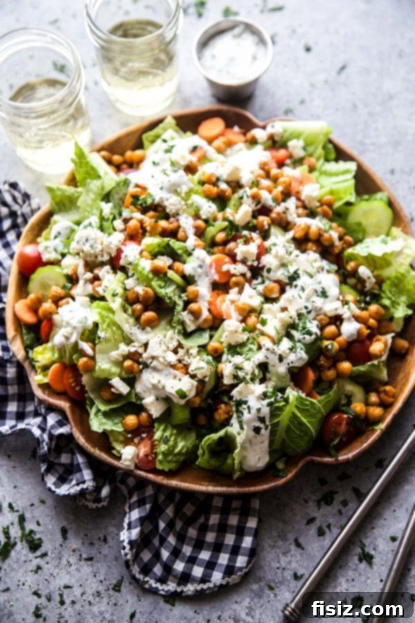 Zesty Chickpea Crunch 6 Overhead view of a prepared Buffalo Chickpea Salad, showcasing all fresh ingredients