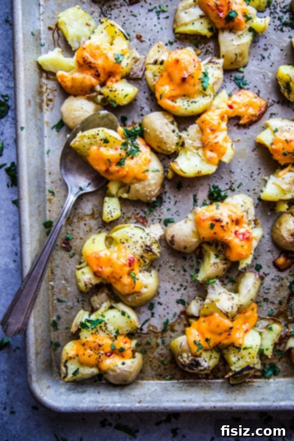 Southern Pimento Cheese Smashed Potatoes 6 Close-up of crispy pimento cheese smashed potatoes