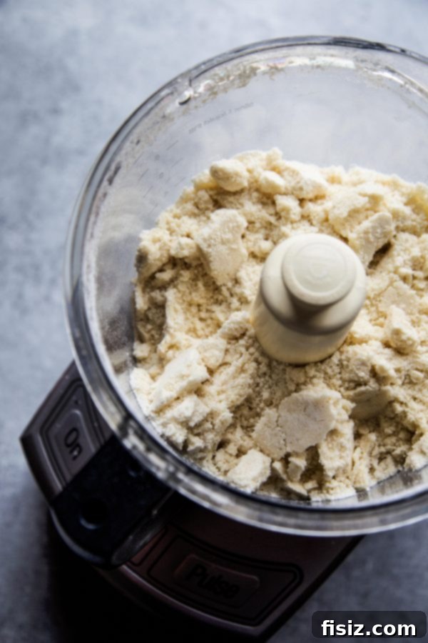 Cobbler topping ingredients being processed in a food processor