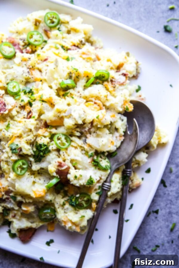 Kickin Popper Potato Salad 2 Jalapeno Popper Potato Salad, a vibrant and creamy side dish perfect for any occasion, featuring crispy bacon and fresh jalapenos.