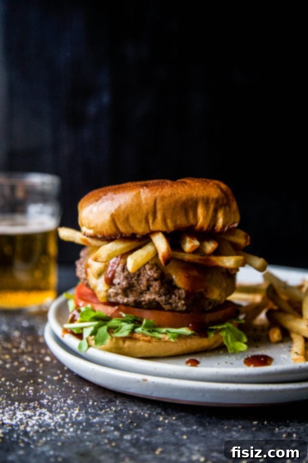 My June Making Wishlist 3 Close-up of a gourmet American Lamb Burger and Frites, a perfect barbecue dish