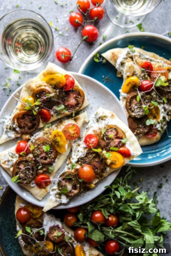 Zaatar Tomato Chickpea Flatbread 3 Close-up of fresh Za'atar Spiced Tomatoes and Chickpea Flatbread with vibrant herbs