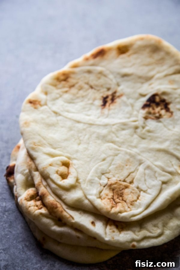 Zaatar Tomato Chickpea Flatbread 6 Pillowy Naan flatbread, ideal for serving with Za'atar Spiced Tomatoes