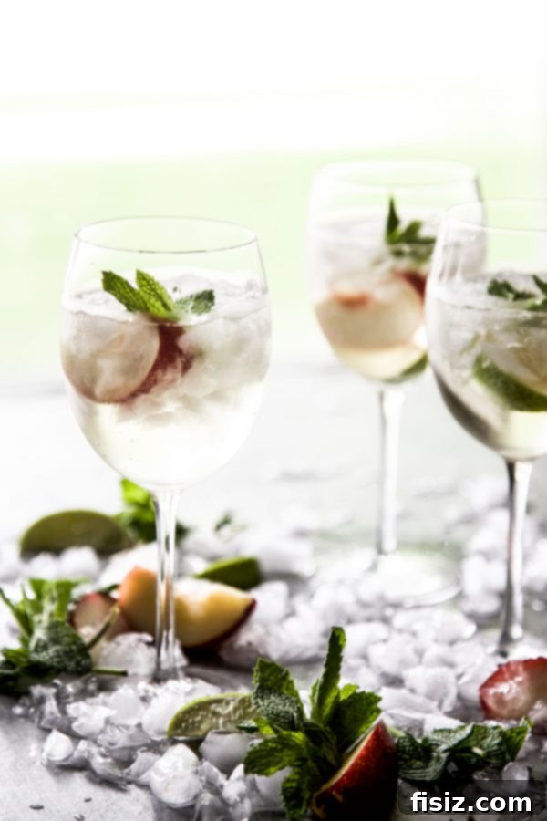 Golden Hour Sangria 6 A collection of Sunset Sangria glasses, ready to be served at a summer gathering