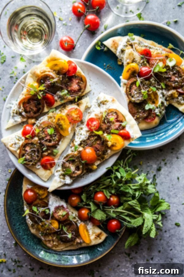 Exciting August DIYs Ahead! 6 Za'atar Spiced Tomatoes & Chickpea Flatbread, showcasing a vibrant tomato dish, perfect for a summer gathering.