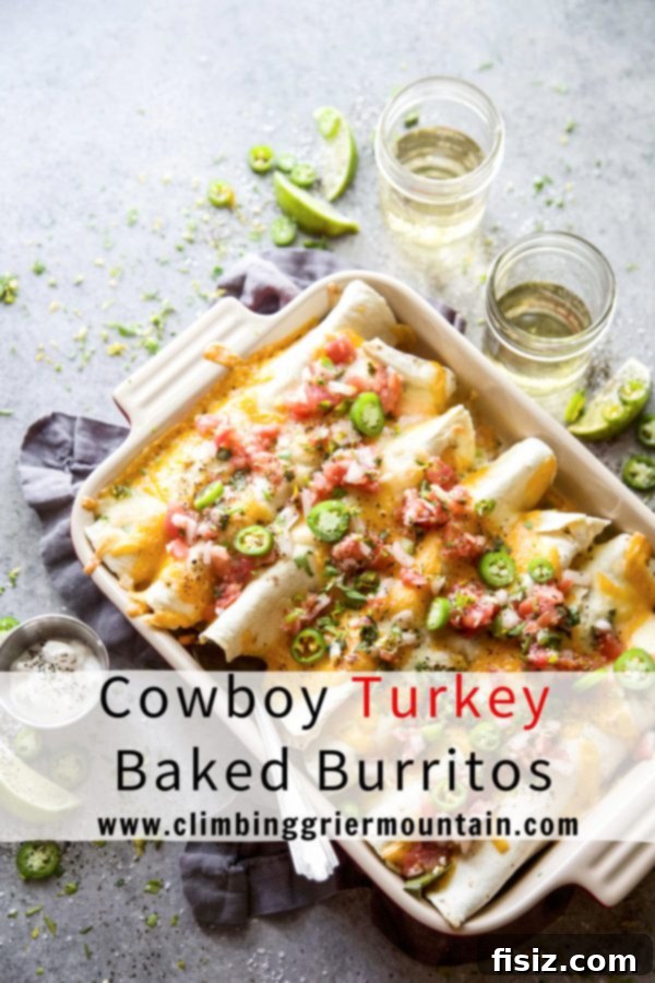 Western Turkey Burrito Bake 8 Close-up of a Cowboy Turkey Baked Burrito with melted cheese and fresh garnishes