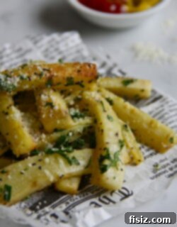 Truffle Parmesan Parsnip Frites 2 A plate of freshly baked Parsnip Parmesan Truffle Fries