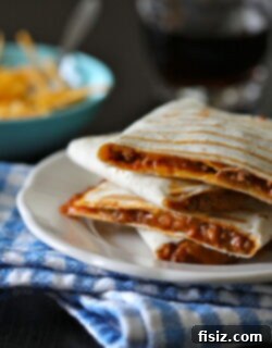 Foodie Fridays Ultimate Sloppy Joe Quesadillas 2 Final plated Sloppy Joe Quesadilla slices, enticing and delicious.