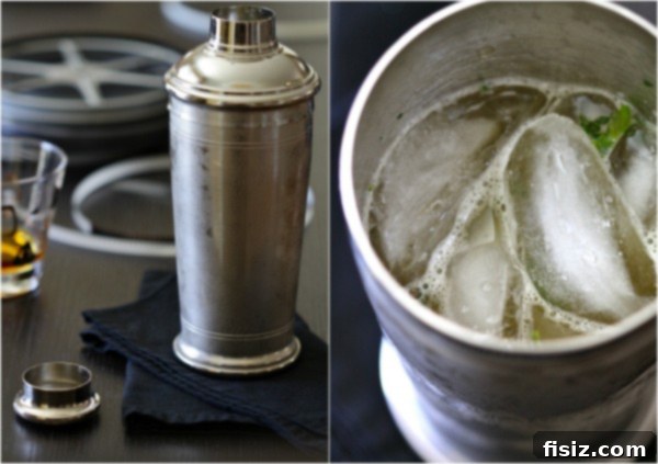 shaker A shiny silver cocktail shaker filled with ice and a frothy drink, ready to be poured.